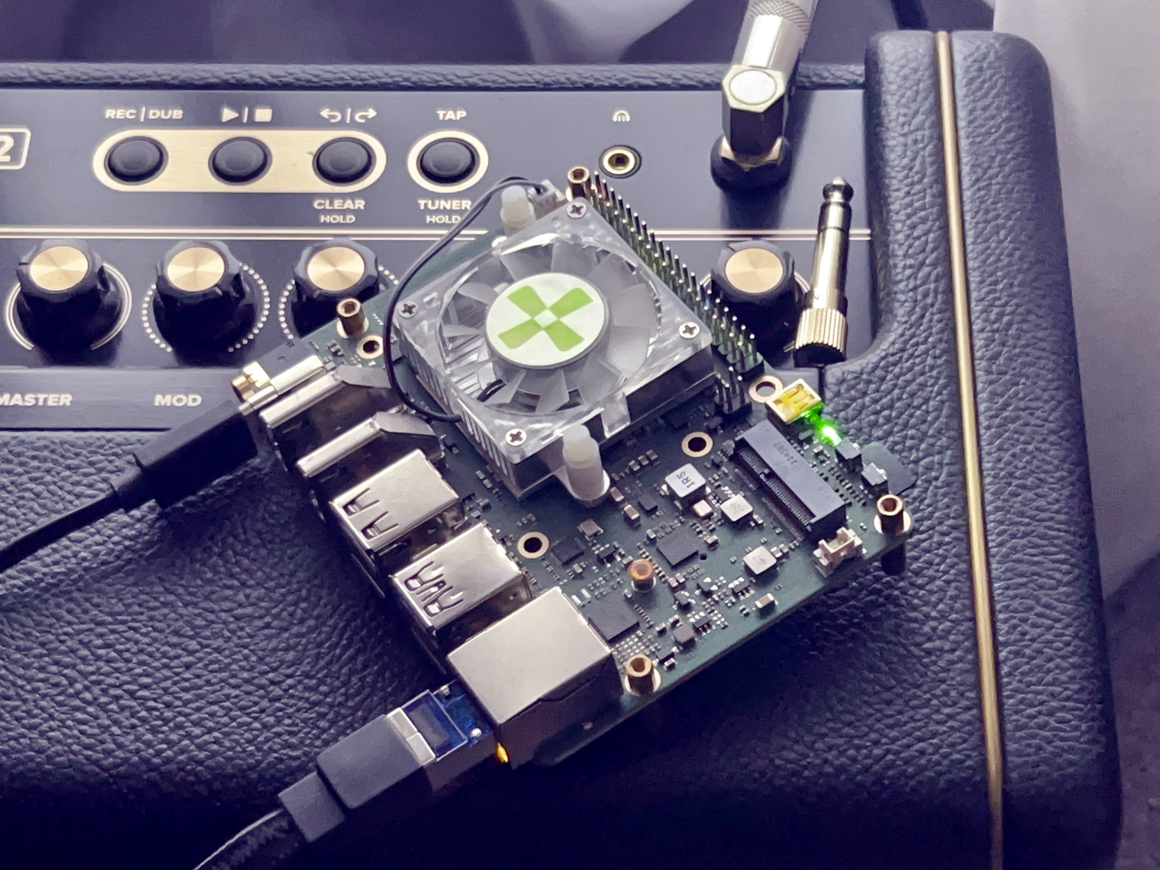 Radxa ROCK 5B single-board computer running the agentic AI system